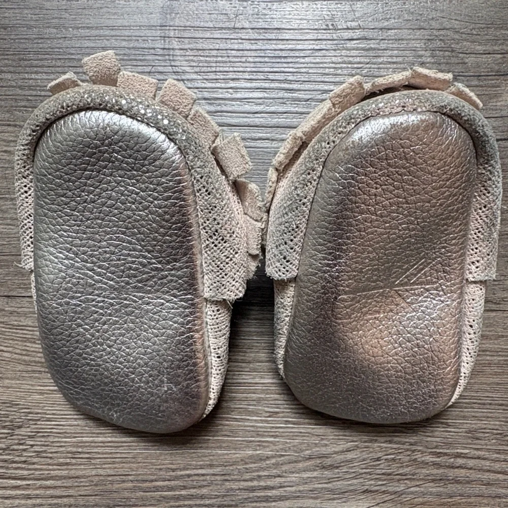 Freshly Picked Infants Leather Fringe Moccasins In Metallic Size 1 3-6 M